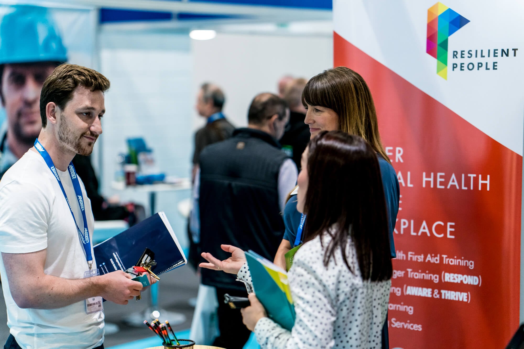 A visitor meeting exhibitors at Safety & Health Expo 2019